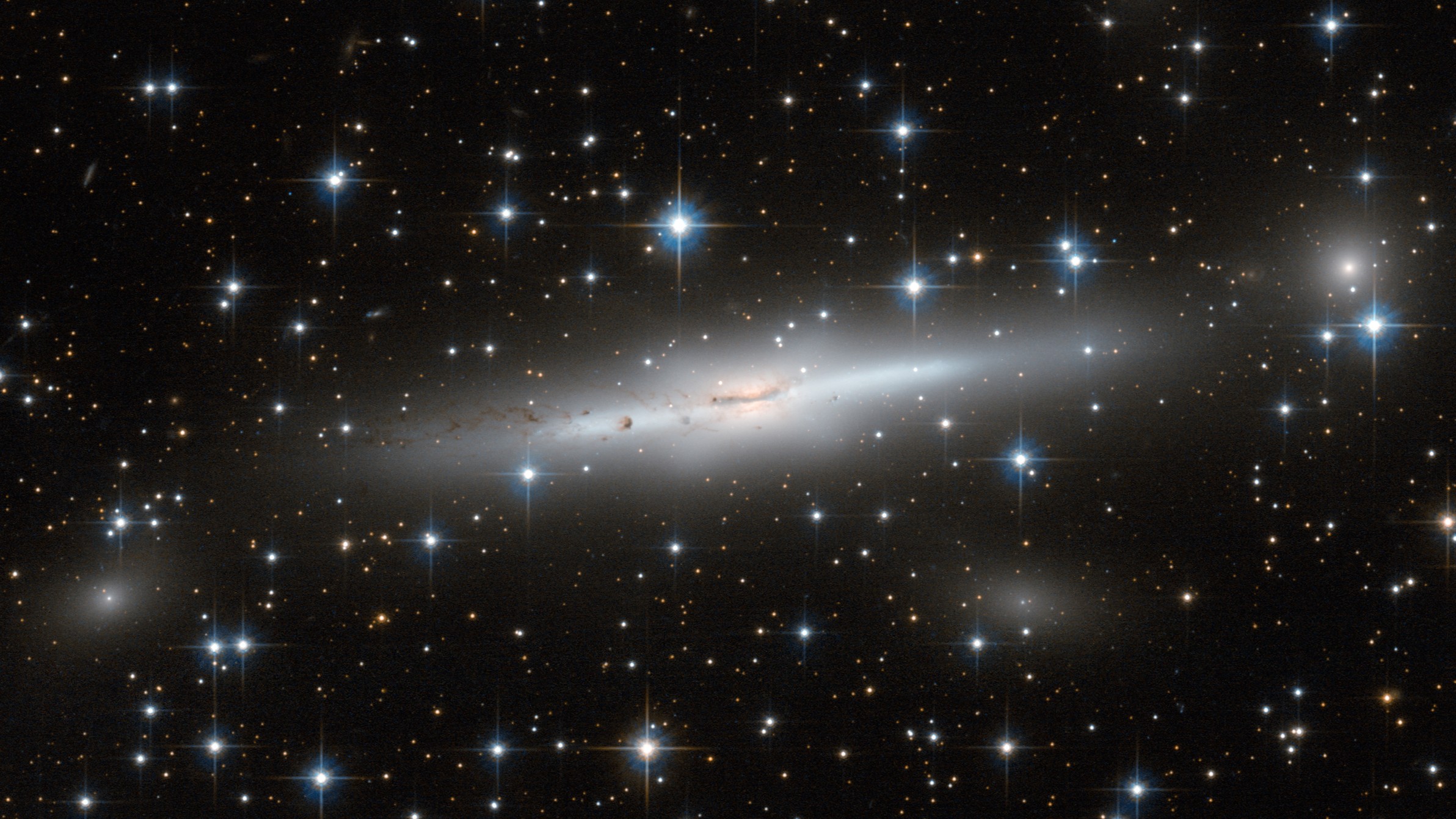 ESO 137-002, a barred spiral galaxy in the Norma Cluster exhibiting ram-pressure stripping