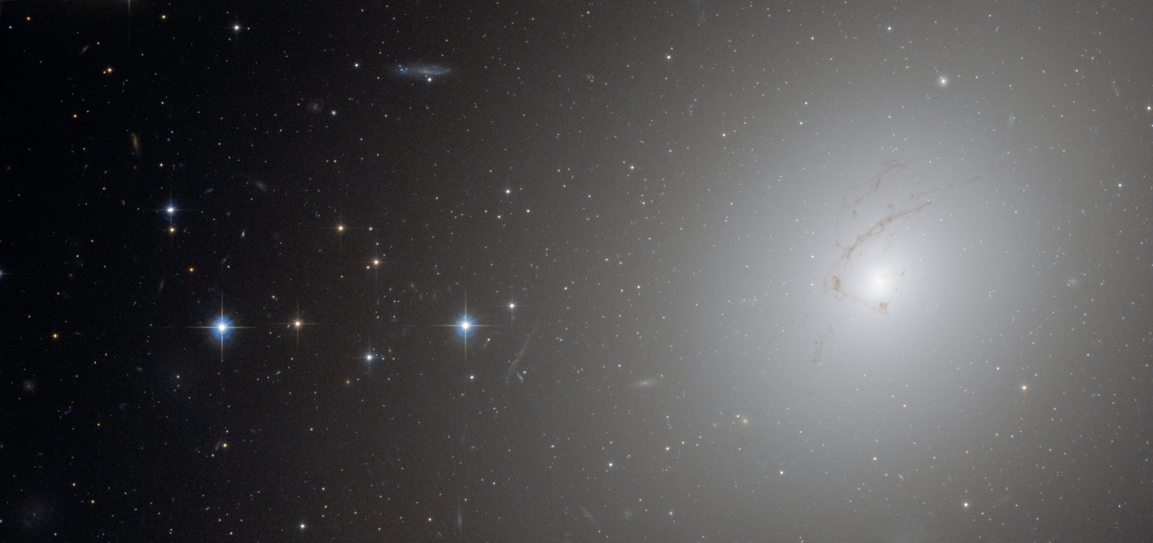 NGC 4696, the giant cD elliptical galaxy at the center of the Centaurus Cluster