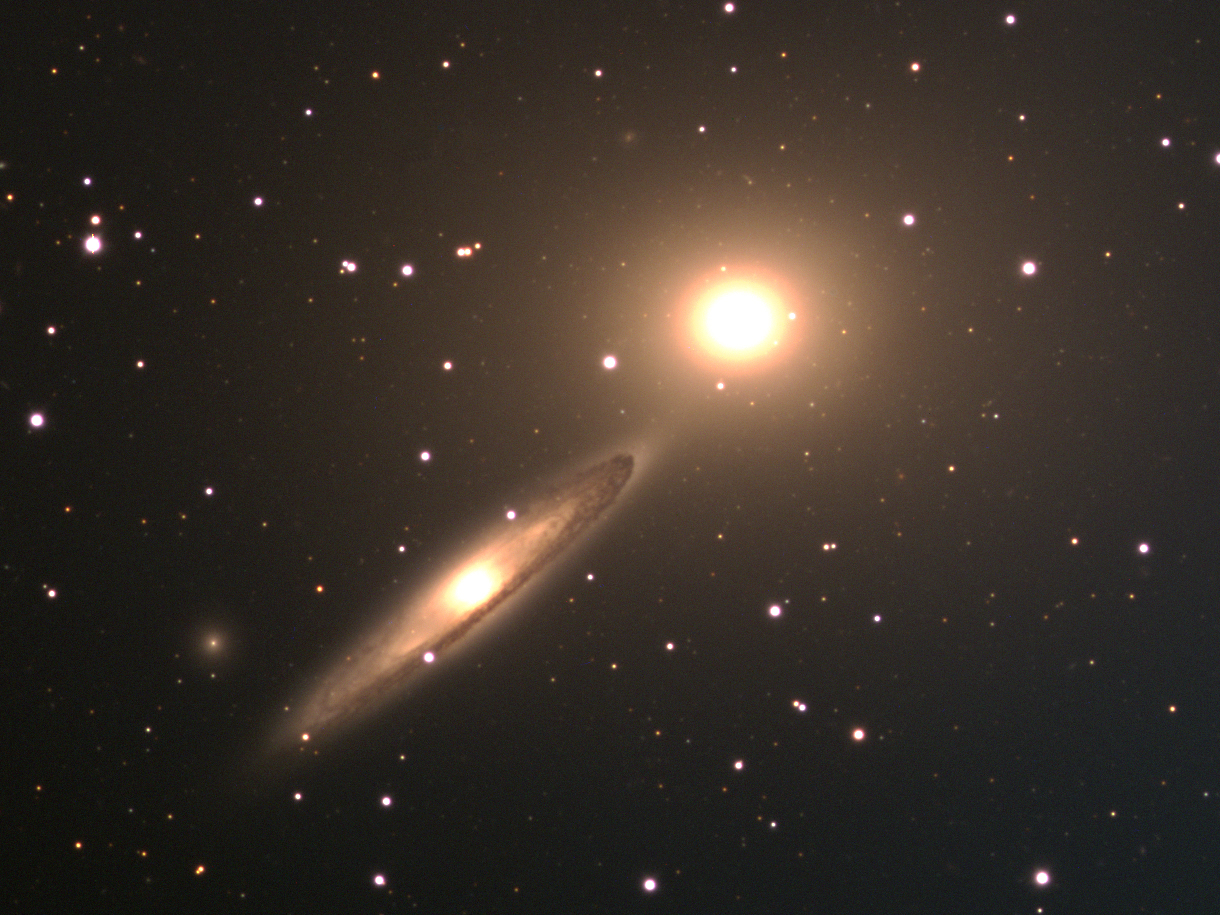 NGC 5090 and NGC 5091, an interacting pair in the NGC 5011 Group