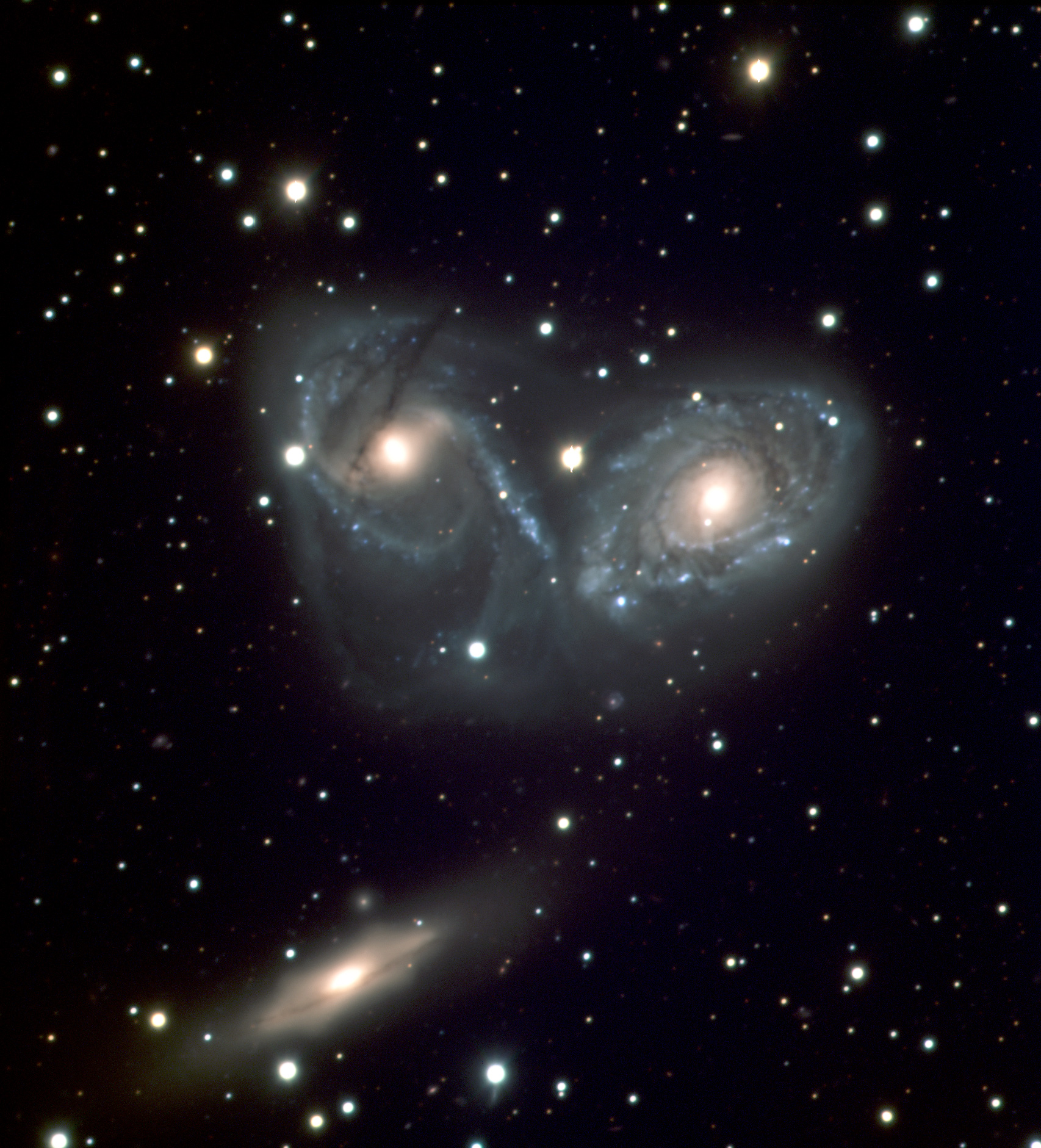 The Devil's Mask — NGC 6769, NGC 6770, and NGC 6771, a gravitationally bound triplet system undergoing active merger in the Southern Filament