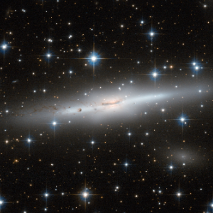 ESO 137-002, a barred spiral galaxy in the Norma Cluster exhibiting ram-pressure stripping
