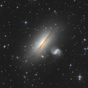 NGC 5078 and IC 879, an interacting pair of galaxies in the Centaurus Wall