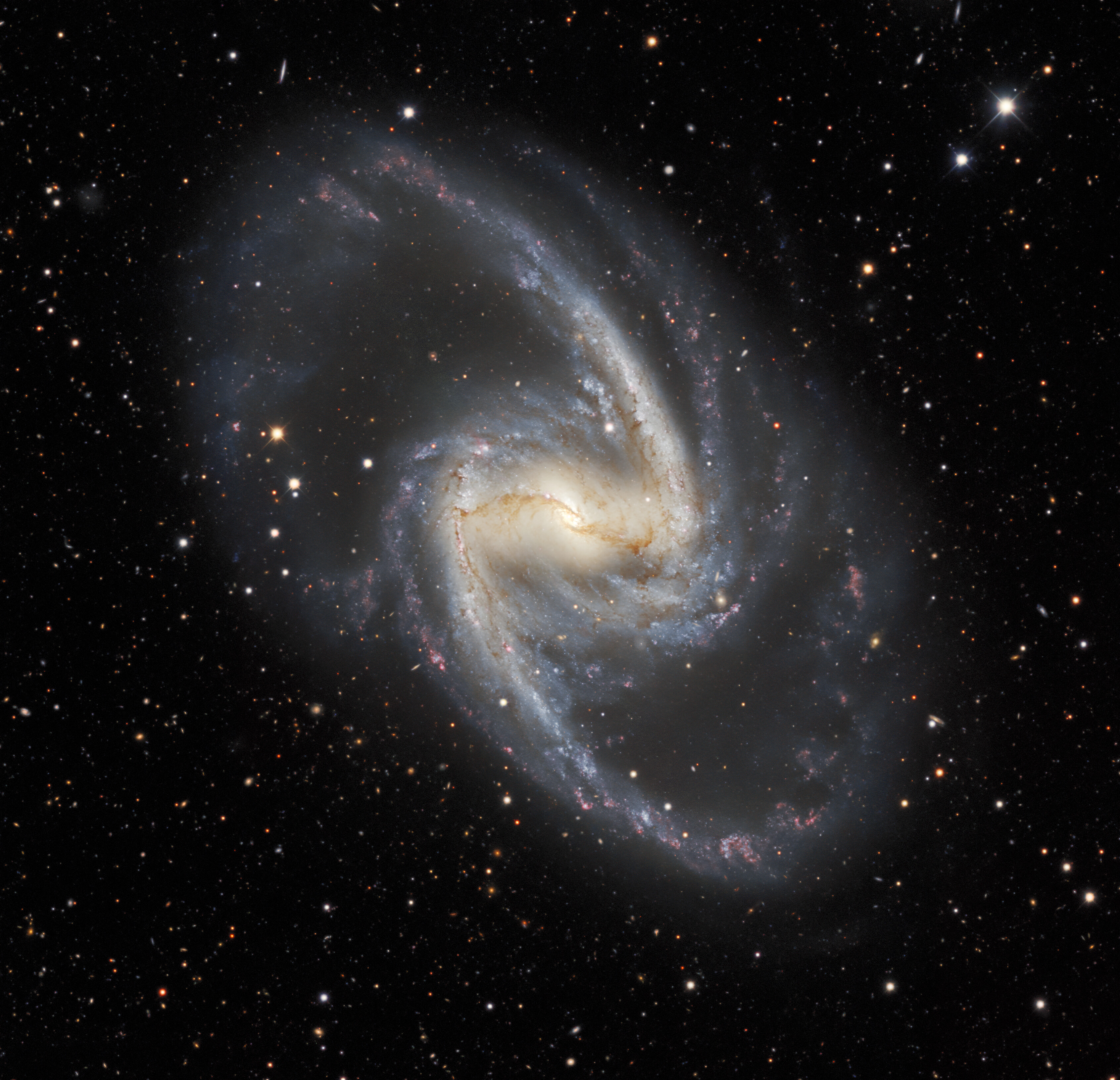 NGC 1365, the Great Barred Spiral, a prominent member of the Fornax Cluster