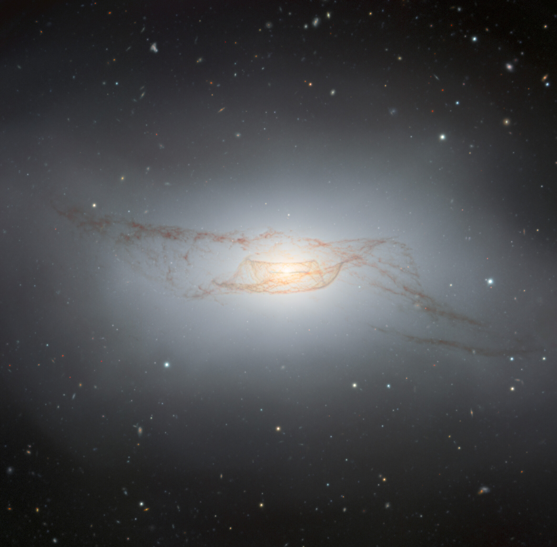 NGC 4753, the gravitational drain where multiple inflowing streams converge in the Southern Extension