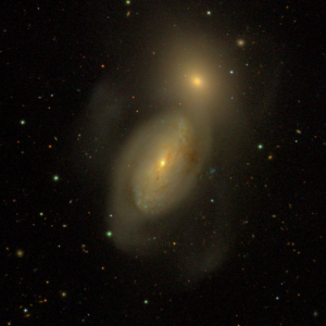 NGC 3227 and NGC 3226, an interacting Seyfert galaxy pair in the Leo Association