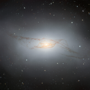 NGC 4753, the gravitational drain where multiple inflowing streams converge in the Southern Extension